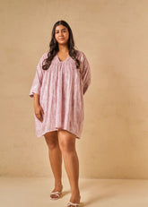 A Model Wearing Purple Organic Cotton The Purple Coral kaftan dress, curated by Only Ethikal